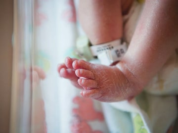 Feet of newborn baby